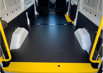 A custom-made flooring insert mounted in a utility van