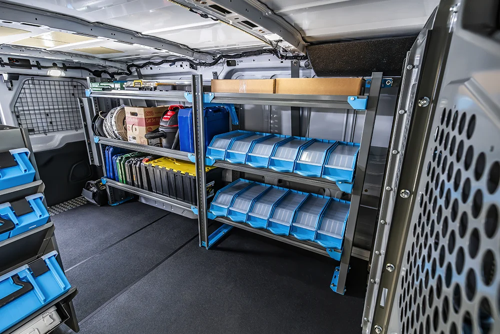 A well-organized, well-equipped van interior loaded with electrical equipment